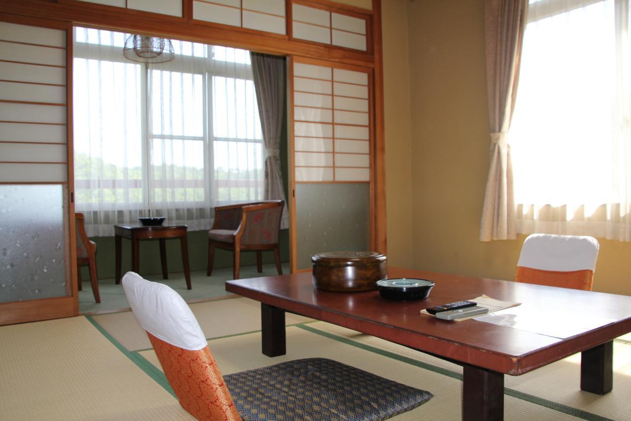 Hotel Tomada Onsen Iyashi No Yado Sensui Okayama Exterior foto